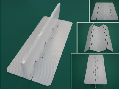 ワンタッチで倒立PAD、新技術「T型クロスロック」の開発